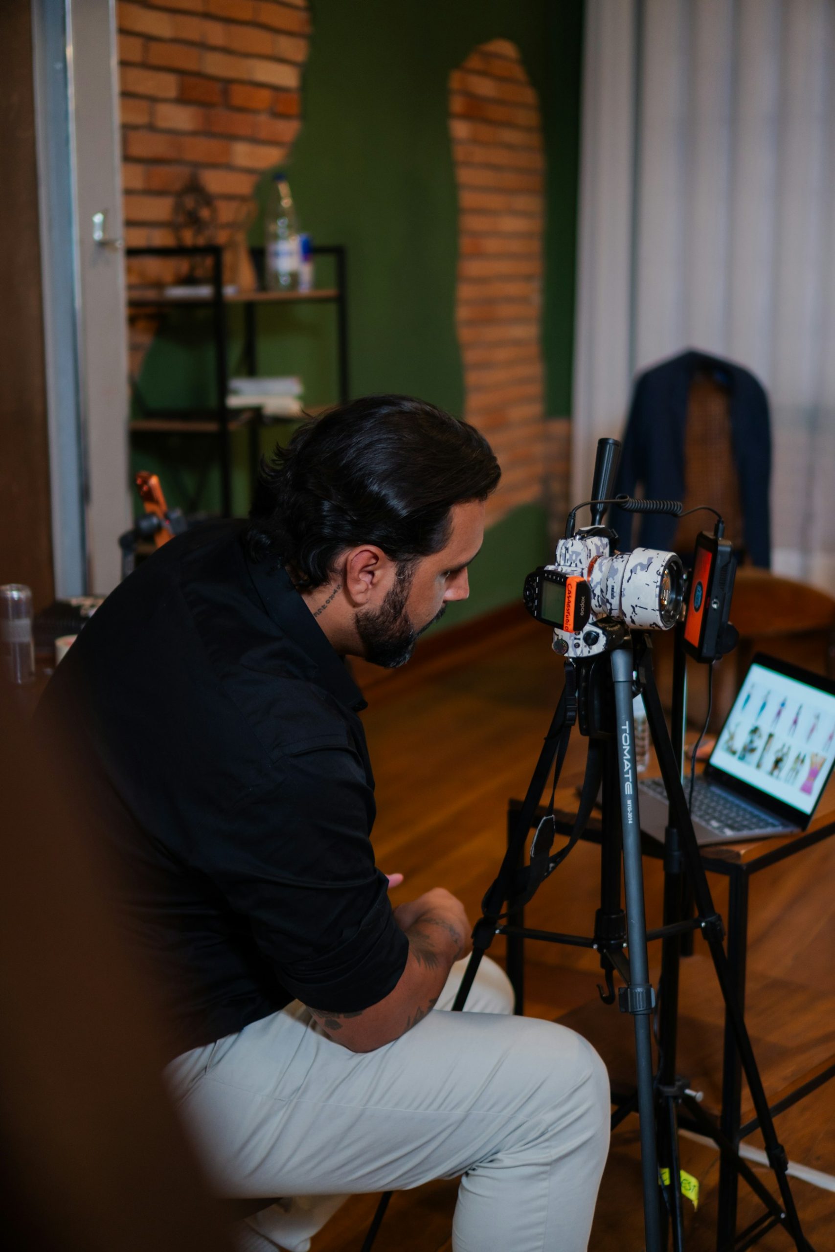 PAC BTS production crew reviewing an on-set camera
